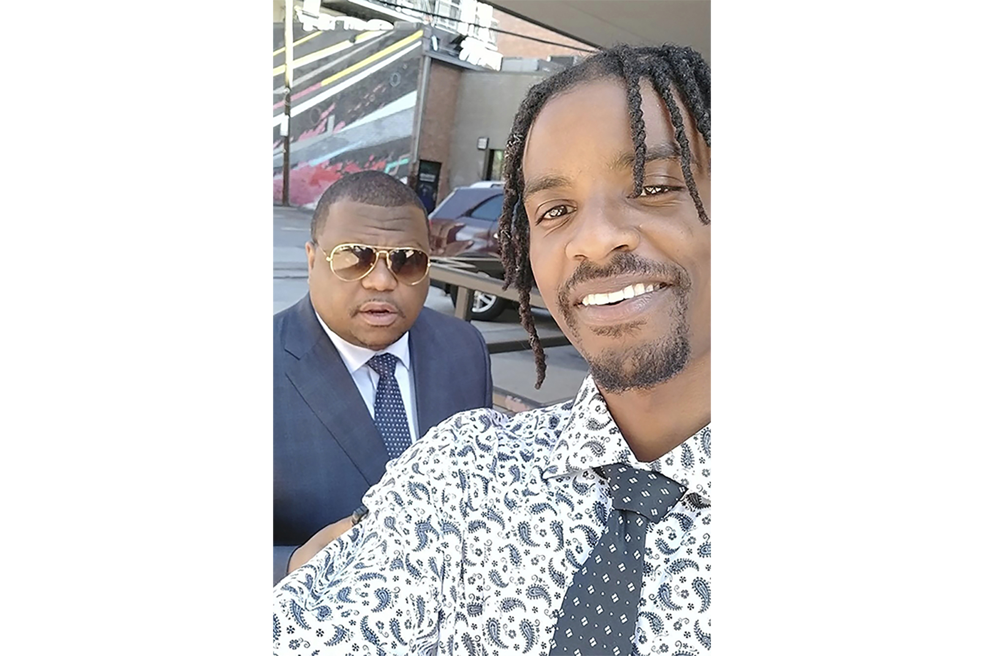 This photo provided by Dalvin Gadson shows Gadson, right, with his attorney, Harry Daniels, April 29, 2024, in Denver. The city of Colorado Springs, Colo., agreed on Tuesday, May 14, to pay $2.1 million to settle a lawsuit brought by Gadson, who was punched and kicked by police during a traffic stop in 2022. (Dalvin Gadson via AP)